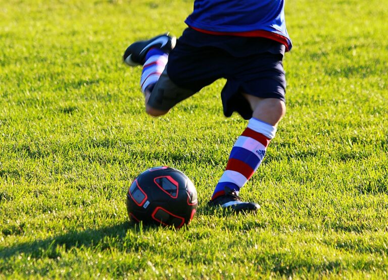 FCD-Kid kicking soccer ball